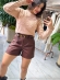 SHORT COURO COM CINTO