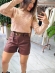 SHORT COURO COM CINTO